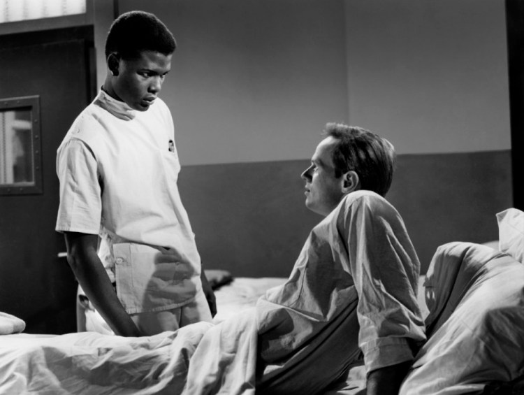 Sidney Poitier (standing) confronts Richard Widmark. Image: Dr Macro